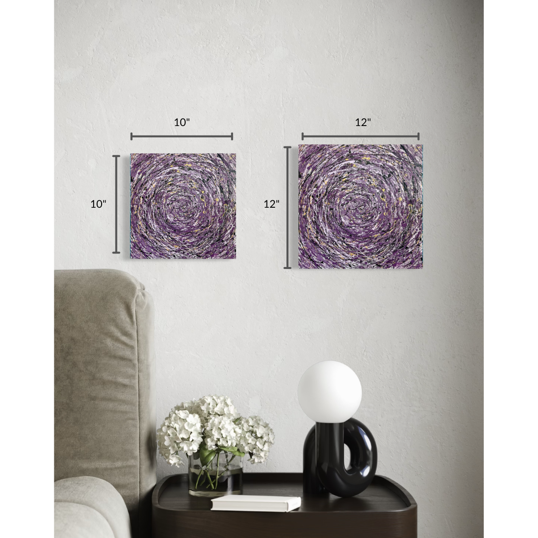 Two square wall art prints with purple spiral abstract designs shown on a light gray wall above a side table. Black dimension lines indicate 10 x 10 inches on the left print and 12 x 12 inches on the right print.